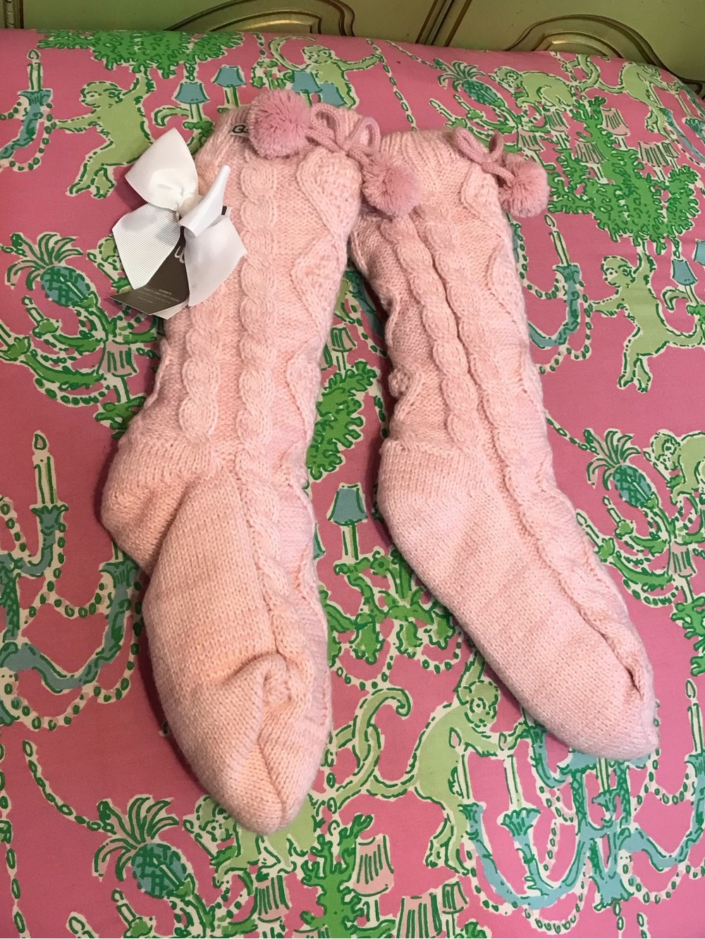 UGG seashell pink cable knit women’s fleece lined cozy socks with Pom Pom bow